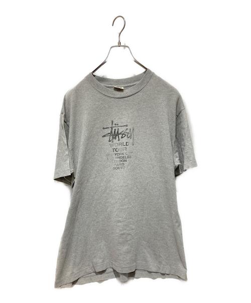 stussy（ステューシー）stussy (ステューシー) ワールドツアープリントTシャツ グレー サイズ:Lの古着・服飾アイテム