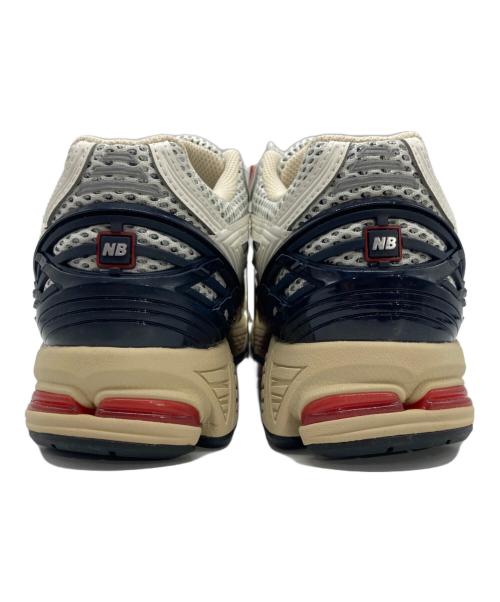 NEW BALANCE（ニューバランス）NEW BALANCE (ニューバランス) ローカットスニーカー ベージュ×レッド サイズ:26 未使用品の古着・服飾アイテム