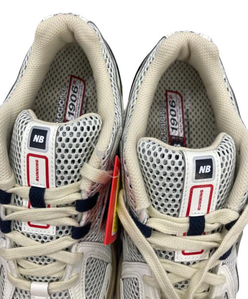 NEW BALANCE（ニューバランス）NEW BALANCE (ニューバランス) ローカットスニーカー ベージュ×レッド サイズ:26 未使用品の古着・服飾アイテム