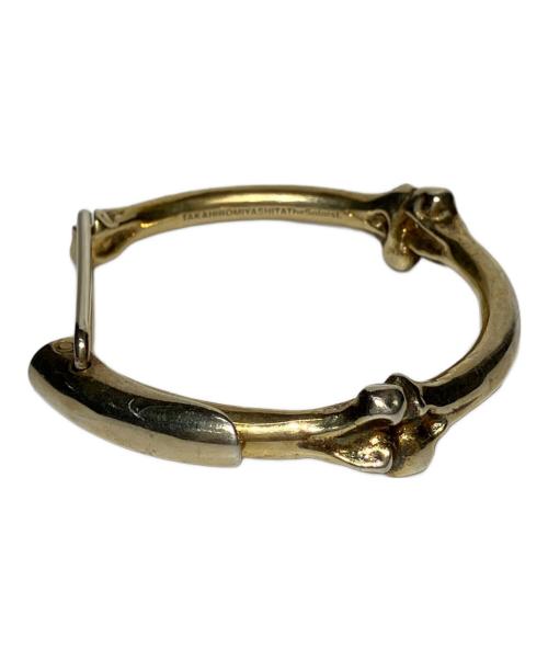 TAKAHIROMIYASHITA TheSoloIst.（タカヒロミヤシタ ザソロイスト）TAKAHIROMIYASHITA TheSoloIst. (タカヒロミヤシタ ザソロイスト) END (エンド) bone shaped clip cuff ゴールド サイズ:Mの古着・服飾アイテム