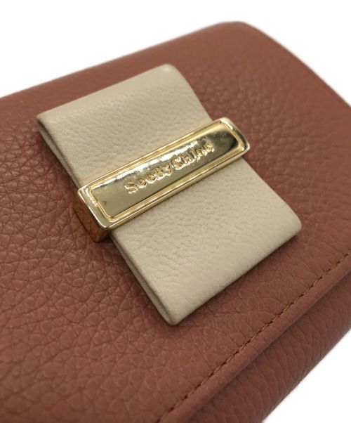 SEE BY CHLOE（シーバイクロエ）SEE BY CHLOE (シーバイクロエ) ROSITA TRI FOLD WALLET ピンクの古着・服飾アイテム