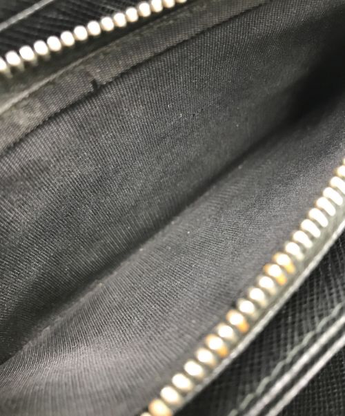 PRADA（プラダ）PRADA (プラダ) サフィアーノラウンドジップウォレット ネイビーの古着・服飾アイテム