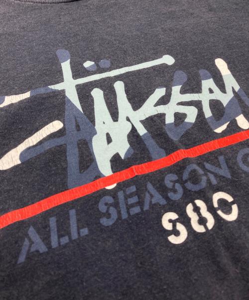 stussy（ステューシー）stussy (ステューシー) プリントTシャツ ネイビー サイズ:Mの古着・服飾アイテム