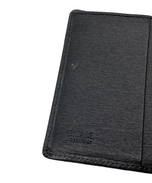 VERSACE（ヴェルサーチェ）VERSACE (ヴェルサーチェ) 2つ折り財布 ブラックの古着・服飾アイテム