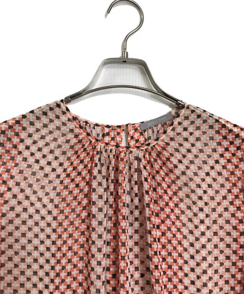 theory luxe（セオリーリュクス）theory luxe (セオリーリュクス) ジオメトリックプリントブラウス　長袖ブラウス　総柄 オレンジ サイズ:38の古着・服飾アイテム