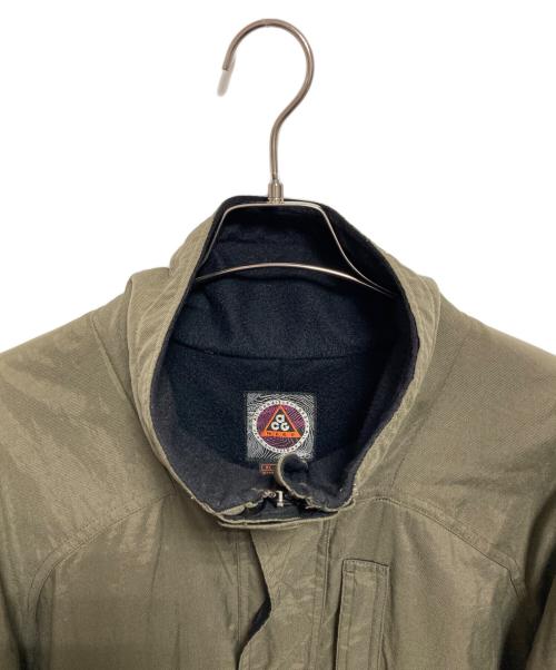 NIKE ACG（ナイキエーシージー）NIKE ACG (ナイキエーシージー) スタンドカラージャケット オリーブ サイズ:XLの古着・服飾アイテム