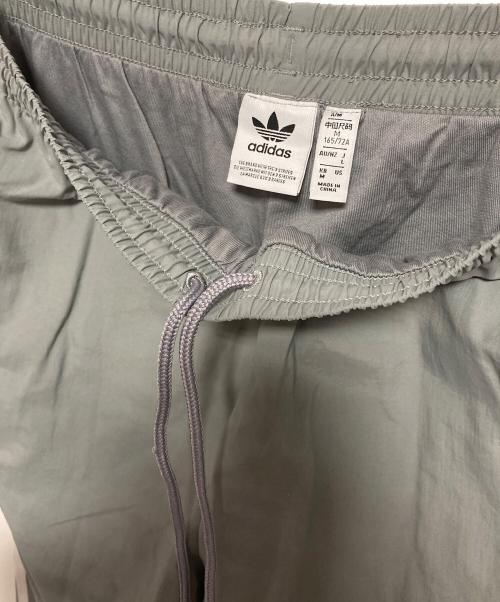 adidas（アディダス）adidas (アディダス) ウーブントラックパンツ グレー サイズ:Lの古着・服飾アイテム