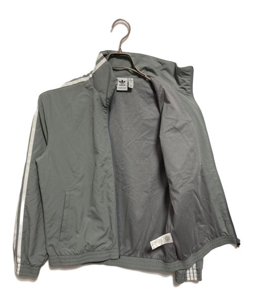 adidas（アディダス）adidas (アディダス) ウーブントラックトップ グレー サイズ:Lの古着・服飾アイテム