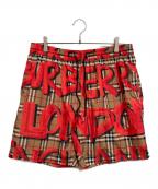 BURBERRY LONDONバーバリーロンドン）の古着「Graffiti Print Vintage Check Swim shorts」｜オレンジ×ベージュ