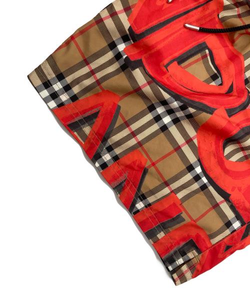 BURBERRY LONDON（バーバリーロンドン）BURBERRY LONDON (バーバリーロンドン) Graffiti Print Vintage Check Swim shorts オレンジ×ベージュ サイズ:Ｌの古着・服飾アイテム