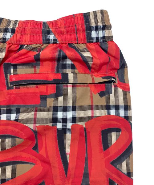 BURBERRY LONDON（バーバリーロンドン）BURBERRY LONDON (バーバリーロンドン) Graffiti Print Vintage Check Swim shorts オレンジ×ベージュ サイズ:Ｌの古着・服飾アイテム