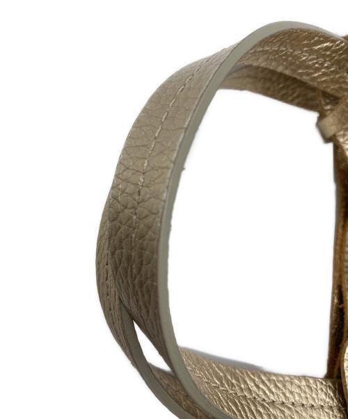 NUR DONATELLA LUCCHI（ヌールドナテッラルッキ）NUR DONATELLA LUCCHI (ヌールドナテッラルッキ) ハンドバッグ ゴールドの古着・服飾アイテム