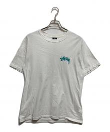 stussy（ステューシー）の古着「TRIBAL MASK TEE」｜ホワイト