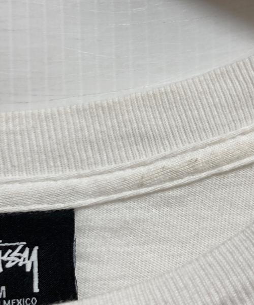 stussy（ステューシー）stussy (ステューシー) TRIBAL MASK TEE ホワイト サイズ:Mの古着・服飾アイテム