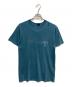 stussy（ステューシー）の古着「トランペットマンプリントTシャツ」｜グリーン