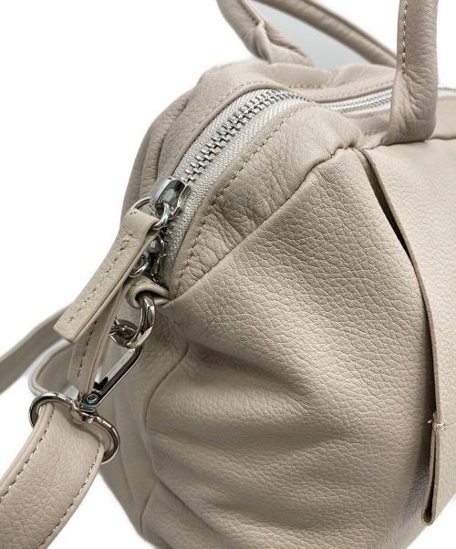 ear PAPILLONNER（イアパピヨネ）ear PAPILLONNER (イアパピヨネ) レザーフラップ2WAYバッグ Sサイズ ベージュの古着・服飾アイテム