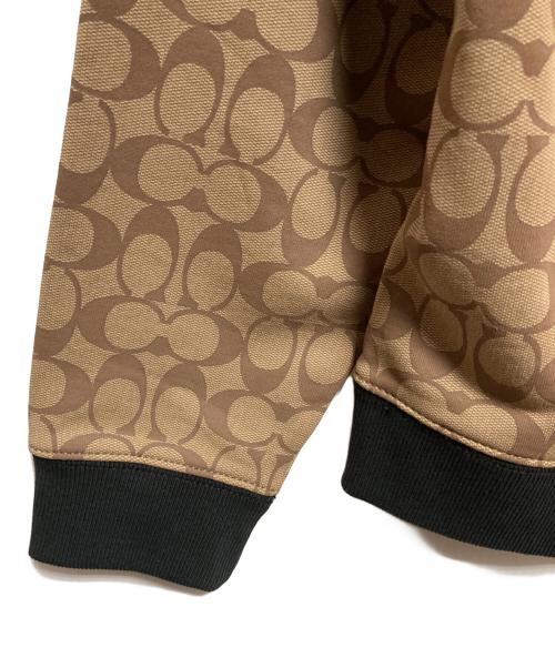 COACH（コーチ）COACH (コーチ) Disney (ディズニー) シグネチャー 101 ダルメシアン フーディー N/A ベージュ サイズ:Mの古着・服飾アイテム