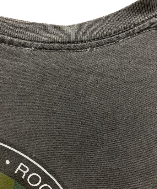 stussy（ステューシー）stussy (ステューシー) スケボーマンラスタサークルTシャツ ブラック サイズ:Lの古着・服飾アイテム