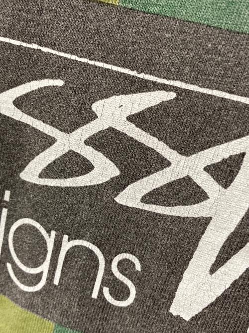 stussy（ステューシー）stussy (ステューシー) スケボーマンラスタサークルTシャツ ブラック サイズ:Lの古着・服飾アイテム