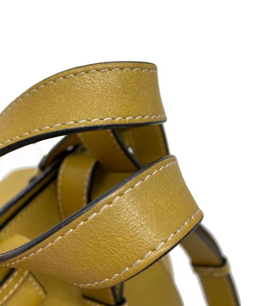 LOEWE（ロエベ）LOEWE (ロエベ) ハンモック ドローストリングバッグ イエローの古着・服飾アイテム
