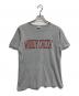 Champion（チャンピオン）の古着「染み込みプリントTシャツ」｜グレー