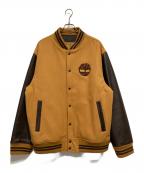 Timberlandティンバーランド）の古着「ロゴ刺繍レザースリーブスタジャン」｜ベージュ