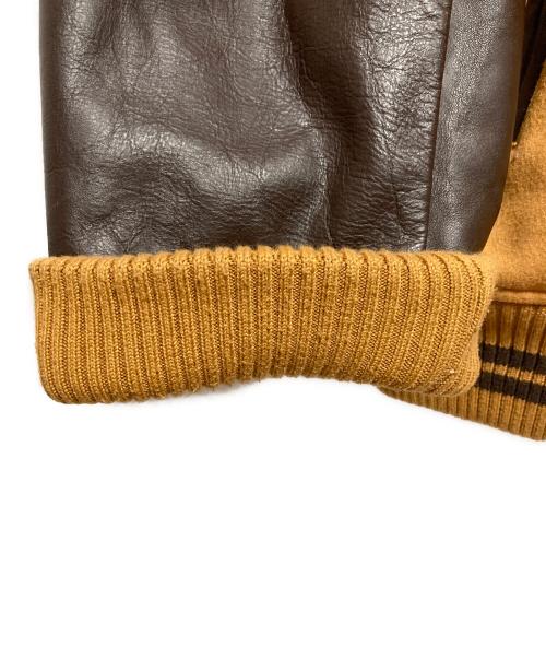 Timberland（ティンバーランド）Timberland (ティンバーランド) ロゴ刺繍レザースリーブスタジャン ベージュ サイズ:XLの古着・服飾アイテム