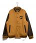 Timberland（ティンバーランド）の古着「ロゴ刺繍レザースリーブスタジャン」｜ベージュ