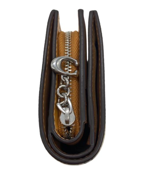 COACH（コーチ）COACH (コーチ) スナップ ウォレット・フローラル プリント イエローの古着・服飾アイテム