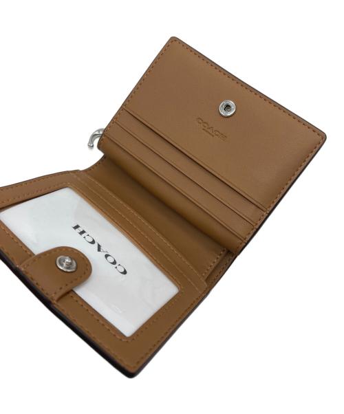 COACH（コーチ）COACH (コーチ) スナップ ウォレット・フローラル プリント イエローの古着・服飾アイテム