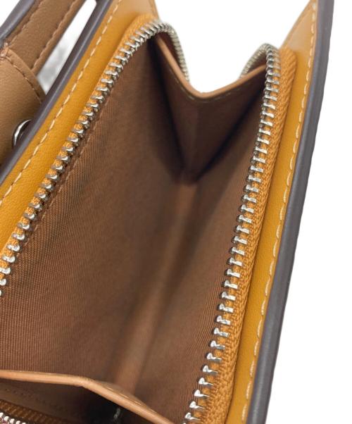 COACH（コーチ）COACH (コーチ) スナップ ウォレット・フローラル プリント イエローの古着・服飾アイテム