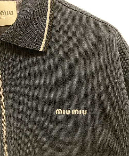 MIU MIU（ミュウミュウ）MIU MIU (ミュウミュウ) ボンデッドピケとテクニカルジャージーのブルゾンジャケット ネイビー サイズ:SIZE 42の古着・服飾アイテム