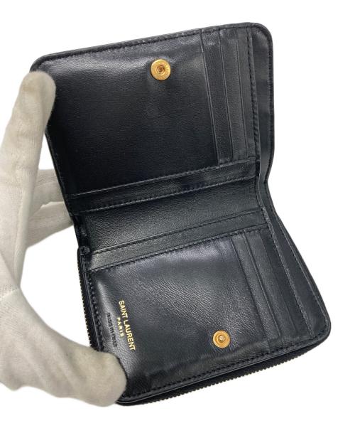 Saint Laurent Paris（サンローランパリ）Saint Laurent Paris (サンローランパリ) Vステッチ2つ折り財布 ブラックの古着・服飾アイテム