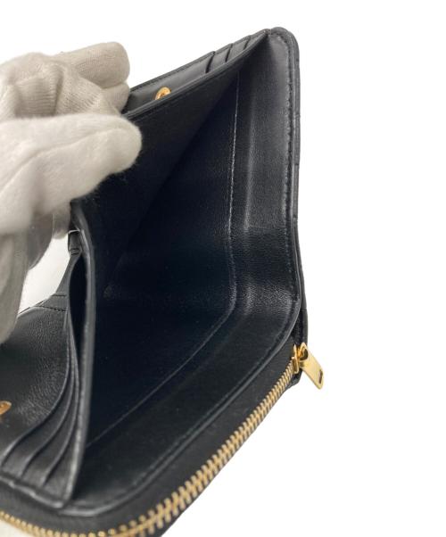 Saint Laurent Paris（サンローランパリ）Saint Laurent Paris (サンローランパリ) Vステッチ2つ折り財布 ブラックの古着・服飾アイテム