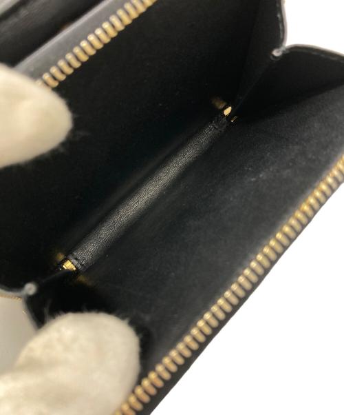 Saint Laurent Paris（サンローランパリ）Saint Laurent Paris (サンローランパリ) Vステッチ2つ折り財布 ブラックの古着・服飾アイテム