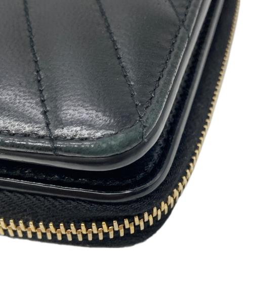Saint Laurent Paris（サンローランパリ）Saint Laurent Paris (サンローランパリ) Vステッチ2つ折り財布 ブラックの古着・服飾アイテム