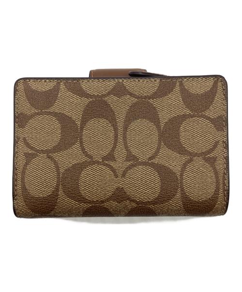 COACH（コーチ）COACH (コーチ) ミディアム コーナー ジップ ウォレット シグネチャー キャンバス ベージュの古着・服飾アイテム