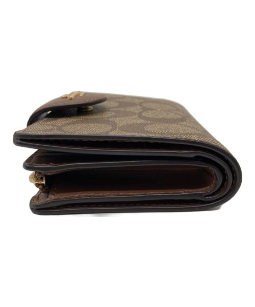 COACH（コーチ）COACH (コーチ) ミディアム コーナー ジップ ウォレット シグネチャー キャンバス ベージュの古着・服飾アイテム