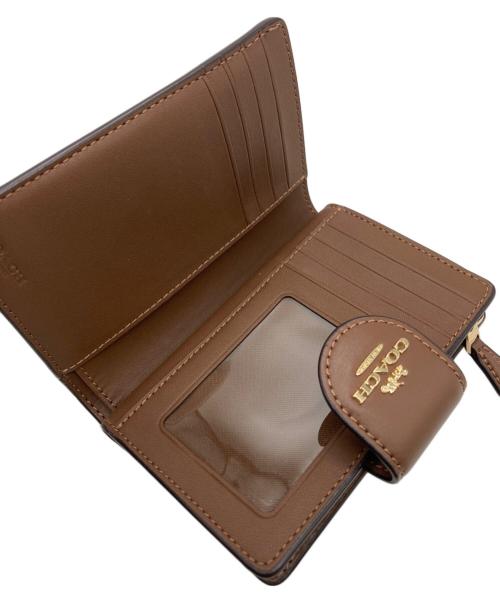 COACH（コーチ）COACH (コーチ) ミディアム コーナー ジップ ウォレット シグネチャー キャンバス ベージュの古着・服飾アイテム