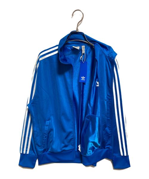 adidas（アディダス）adidas (アディダス) アディカラー クラシックス ルーズ ファイヤーバード トラックトップ ブルー サイズ:L 未使用品の古着・服飾アイテム