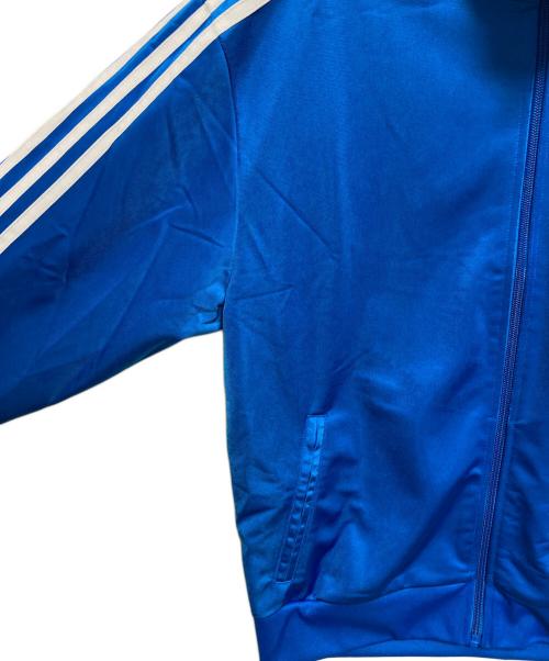 adidas（アディダス）adidas (アディダス) アディカラー クラシックス ルーズ ファイヤーバード トラックトップ ブルー サイズ:L 未使用品の古着・服飾アイテム