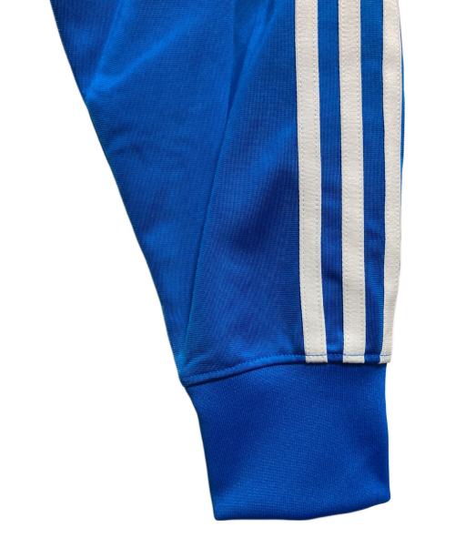 adidas（アディダス）adidas (アディダス) アディカラー クラシックス ルーズ ファイヤーバード トラックトップ ブルー サイズ:L 未使用品の古着・服飾アイテム