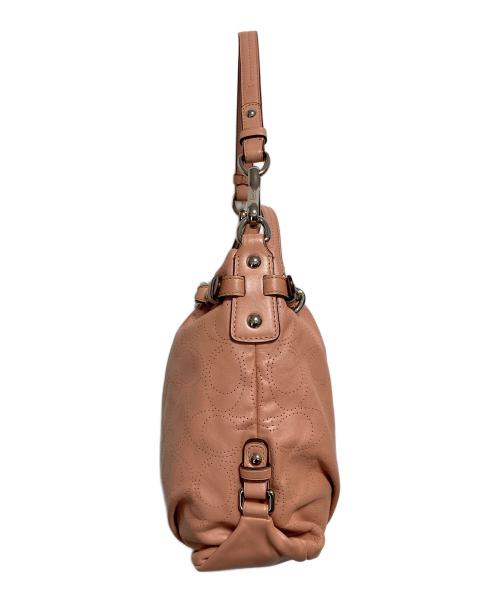 COACH（コーチ）COACH (コーチ) パンチングシグネチャー2WAYバッグ ピンクの古着・服飾アイテム