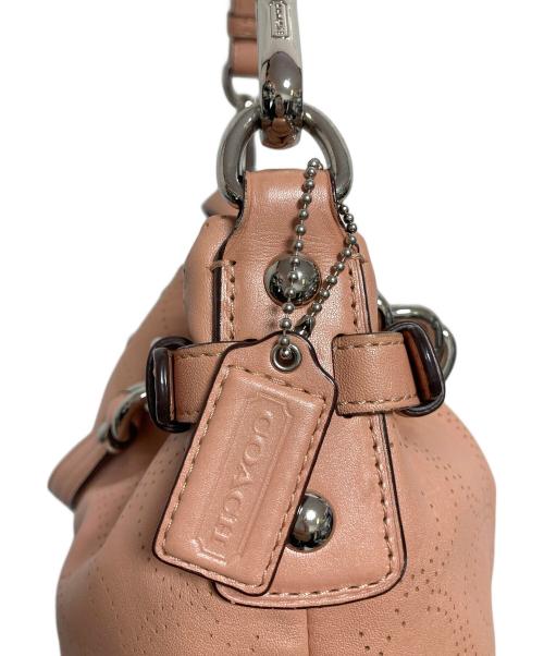 COACH（コーチ）COACH (コーチ) パンチングシグネチャー2WAYバッグ ピンクの古着・服飾アイテム