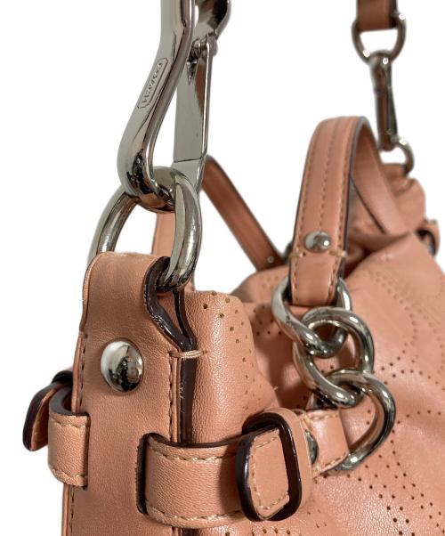 COACH（コーチ）COACH (コーチ) パンチングシグネチャー2WAYバッグ ピンクの古着・服飾アイテム