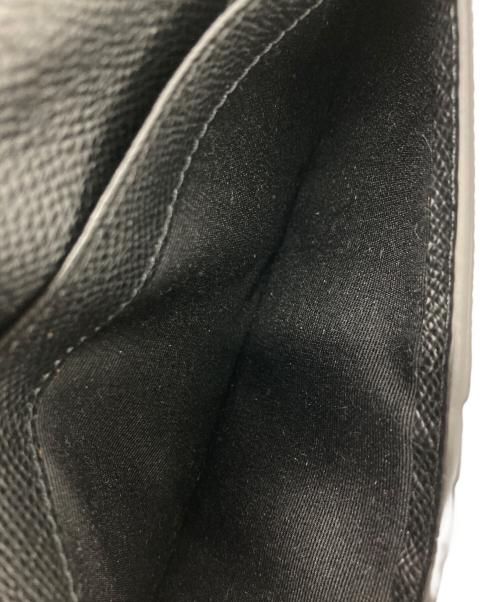 BURBERRY（バーバリー）BURBERRY (バーバリー) アイコンストライフロングウォレット ブラックの古着・服飾アイテム