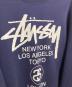 中古・古着 stussy (ステューシー) WORLD TOUR スウエット ネイビー サイズ:L：9000円