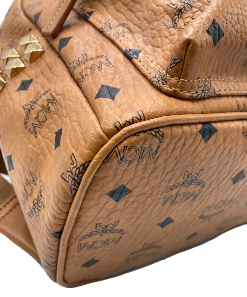 MCM（エムシーエム）MCM (エムシーエム) スタッズリュック ブラウンの古着・服飾アイテム