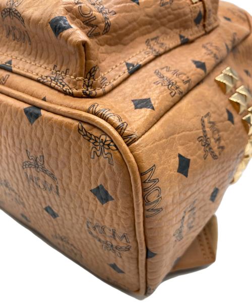 MCM（エムシーエム）MCM (エムシーエム) スタッズリュック ブラウンの古着・服飾アイテム