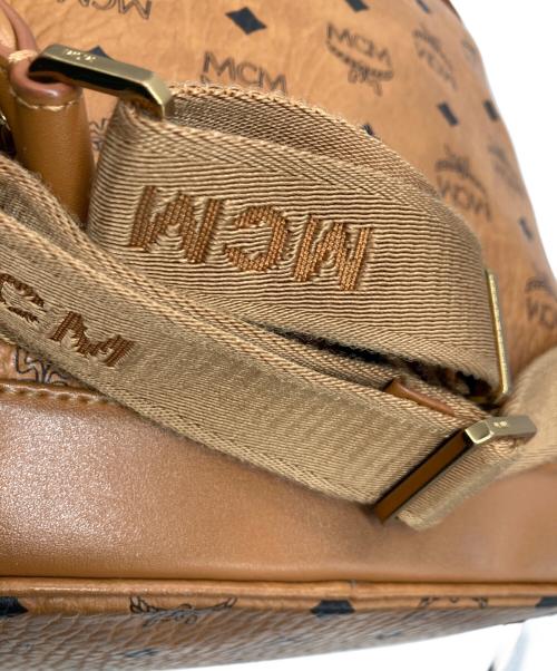 MCM（エムシーエム）MCM (エムシーエム) スタッズリュック ブラウンの古着・服飾アイテム